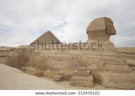 CAIRO, EGYPT - DECEMBER 2009: A view of the Sphinx and the Great Pyramids of Giza located on the outskirts of Cairo.