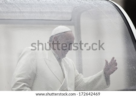 VATICAN CITY, VATICAN - January 22 :  Pope Francis greets the pilgrims during his weekly general audience in St Peter\'s square at the Vatican on January 22, 2014.