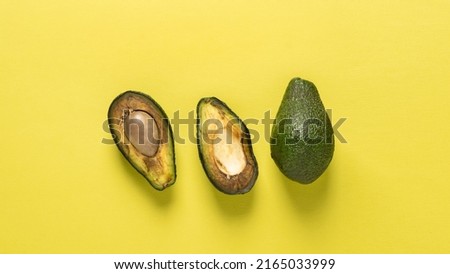 Spoiled rotten fruit vegetables avocado yellow background. Top view copy space Stock foto © 