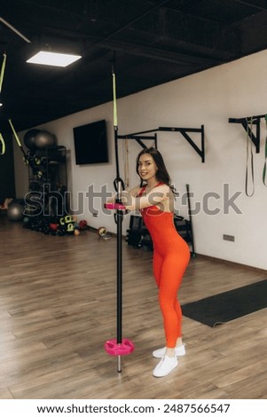 Similar – Image, Stock Photo Woman practicing weightlifting in the gym