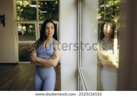 Similar – Image, Stock Photo Slim sportswoman standing near building on street