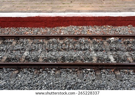 Railway track. Parallel lines of the rails and the edges of the platform. Geometric lines.