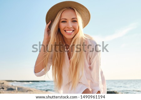 Similar – Image, Stock Photo Summer portrait of long haired teen girl making kissing mouth and showing Victory sign