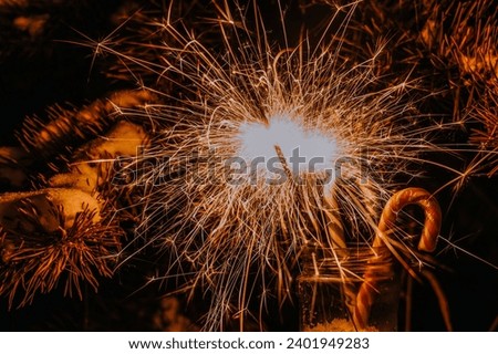 Similar – Image, Stock Photo Sparkler against blurred person in nature