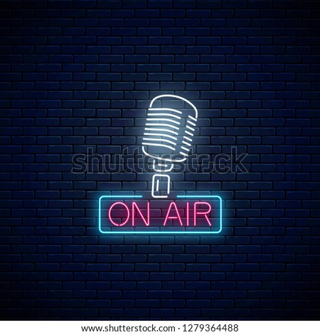 Neon on the air sign with retro microphone on dark brick wall background. Glowing signboard of radio station. Sound cafe icon. Music show poster. Vector illustration.