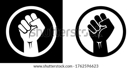 Black raised fist protest symbol icons. Clenched fist with circle isolated on black and white backgrounds. Justice, solidarity, anti-racism and strength gesture icon set.
Emancipation and freedom. ストックフォト © 