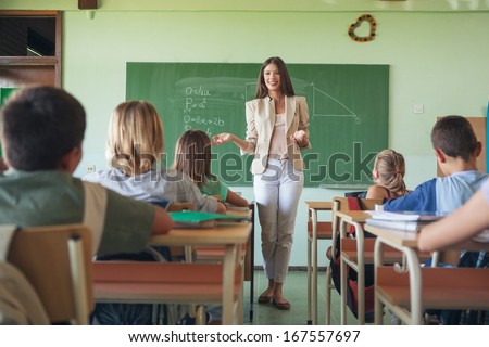 Maths teacher and her studens during a lesson.