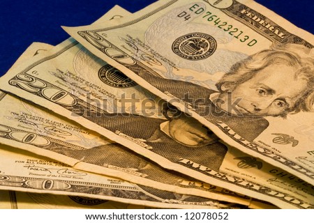 Close up of four american twenty dollar bills showing Andrew Jackson