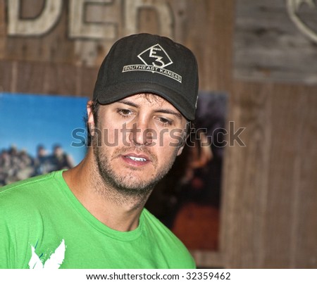 NASHVILLE, TN - JUNE 14: Country singer Luke Bryan signs autographs in the Nashville Convention Center during the CMA Festival June 14, 2009 in Nashville, Tennessee.