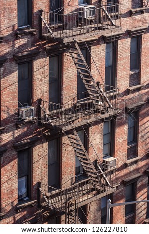 Fire steps on front brick building in Brooklyn, New York.
