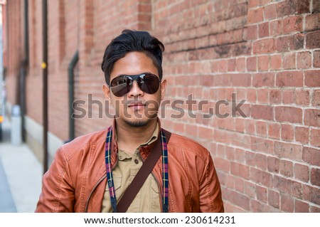 Thai black-skin man with sun glasses traveling