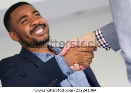 Black business man girl shaking hands