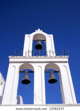 Three church bells on a greek bell tower