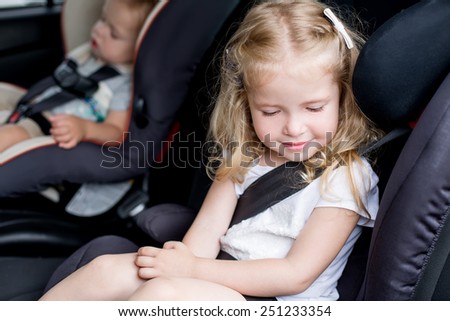 Toddler cute kids in car seats summer