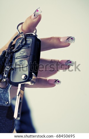 Car keys on fingers - cross process colors