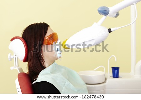 Woman taking care in dental office