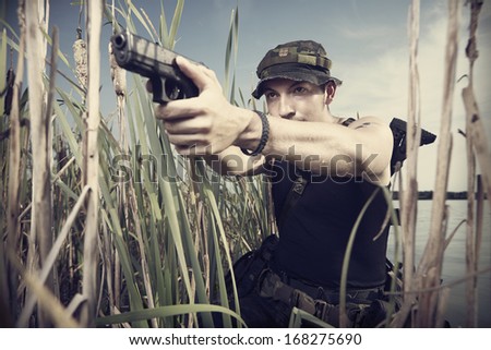 Armed man with pistol