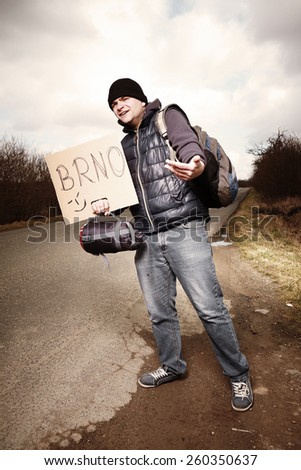 Man hitch-hiking on local European route to reach Brno city