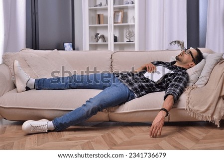 Similar – Image, Stock Photo Man with glasses sleeps and rests