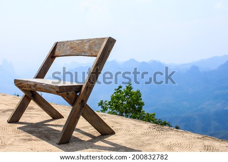 wood chair with mountain view