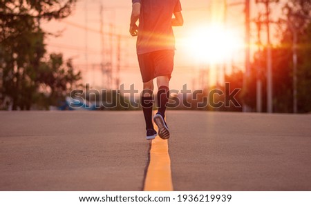 Blurry subject Man running on road Foto stock © 