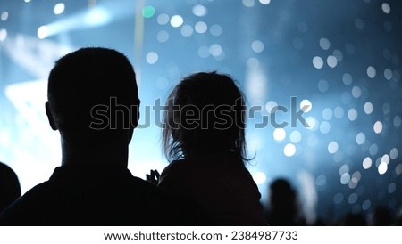 Similar – Image, Stock Photo Amazed happy little girl unwrapping birthday present party at home