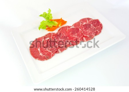 High grade sliced Hida wagyu beef isolated on white background