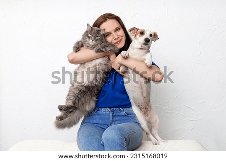 Similar – Image, Stock Photo A woman petting a street dog