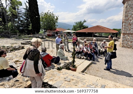 OHRID, MACEDONIA, MAY 18, 2011. Tourists in the archeological site around the newly built St. Clement\'s Church in Ohrid, Macedonia, on May 18th, 2011.