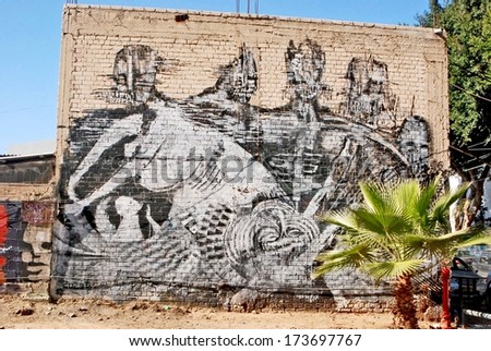 TEL AVIV, ISRAEL, DECEMBER 24, 2013. Graffiti in the wall in the Florentine district of Tel Aviv, Israel, on December 24th, 2013.