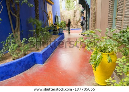 MAJORELLE GARDEN, MARRAKECH, MOROCCO, MAY 11, 2014. The blue house and red corridors in the adobe of the fashion guru Yves Saint-Laurent, in Marrakech, Morocco, on May 11th, 2014.