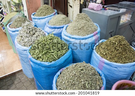 MARRAKECH, MOROCCO, MAY 11, 2014. Big bags of spices, herbs and tea for sale in a bazar in Marrakech, Morocco, on May 11th, 2014.