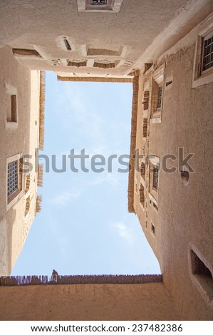OUARZAZATE, MOROCCO, MARCH 8, 2014. The sky is seen from the open hole in the roof of an open air courtyard of Kasbah Taourirt in Ouarzazate, in Morocco, on March 8th, 2014.