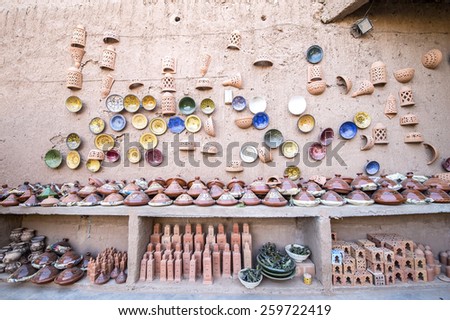 TAMEGROUTE, MOROCCO, MAY 13, 2014. Plates, pots and artifacts made of clay in the yard of the famous Maison de poterie Tamegroute, Morocco, on May 13th, 2014.