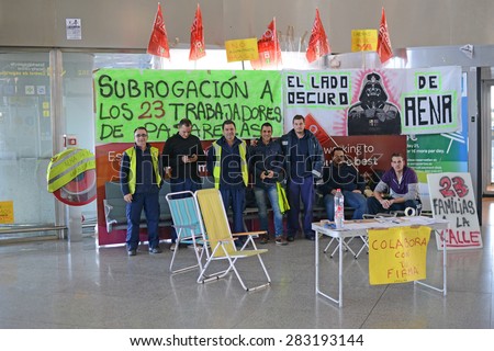 MALAGA AIRPORT, SPAIN, NOVEMBER 21, 2013. Airport workers striking and demonstrating at the Malaga airoorti in Spain, on November 21st, 2013.