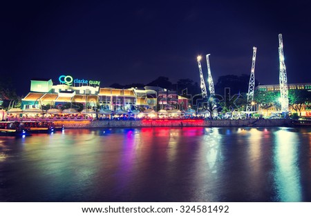 CLARKE QUAY, SINGAPORE - AUGUST 23: Night view of Clarke Quay at river valley road Singapore On August 23, 2015.Clarke quay is historical riverside quay at the Singapore river (With Instagram Effect)