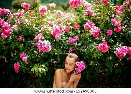 lady in the garden of roses