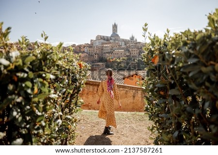 Similar – Image, Stock Photo Stylish traveling woman with backpack resting near sea