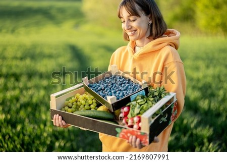 Similar – Image, Stock Photo Female hand with radish in hand in a fruit shop