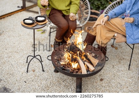 Similar – Image, Stock Photo fire in the garden	fireplace made of old metal barrel