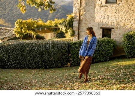Similar – Image, Stock Photo Woman walking on grassy shore