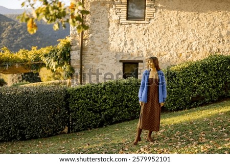 Similar – Image, Stock Photo Woman walking on grassy shore