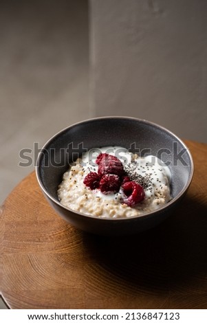 Image, Stock Photo Hot porridge with frozen blueberries