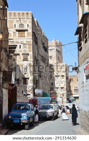 Sana\'a, Yemen, March, 18, 2014. Yemeni scene: People walking on the street in the center of old town Sana\'a