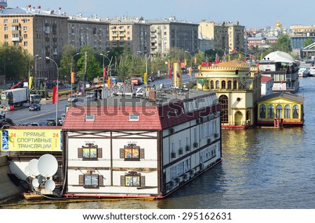 Moscow, Russia, May, 01,2014, Russian scene: cars and floating restaurants on the Frunzenskaya embankment