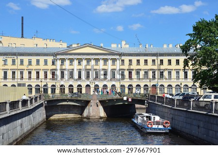 ST. PETERBURG, PUSSIA, July, 20, 2014. Russian scene: river trips through the canals of St. Petersburg. The Adamini house on the embankment of the Moika river
