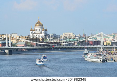 Moscow, Russia, May, 01, 2014, Russian scene: River trips on the boat on the Moscow river, a view to the Cathedral of Christ the Saviour and Krimsky bridge