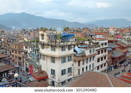 Kathmandu, Nepal,, September, 27, 2013, Nepali  Scene: People walking on ancient center of the city.  In may 2015 square partially destroyed during the earthquake