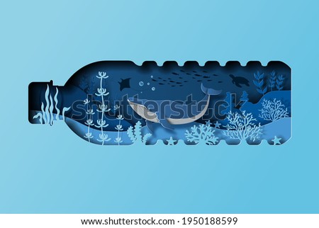 World oceans day concept, the blue whale in a bottle of water. Help to protect animals and the environment, paper illustration, and 3d paper.