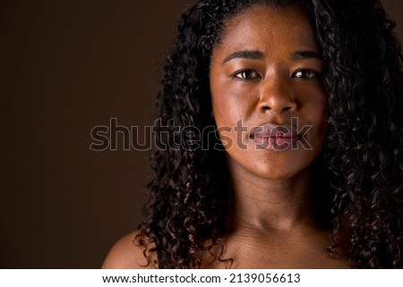 Similar – Image, Stock Photo Portrait of a sad, crouching man in a black hoodie